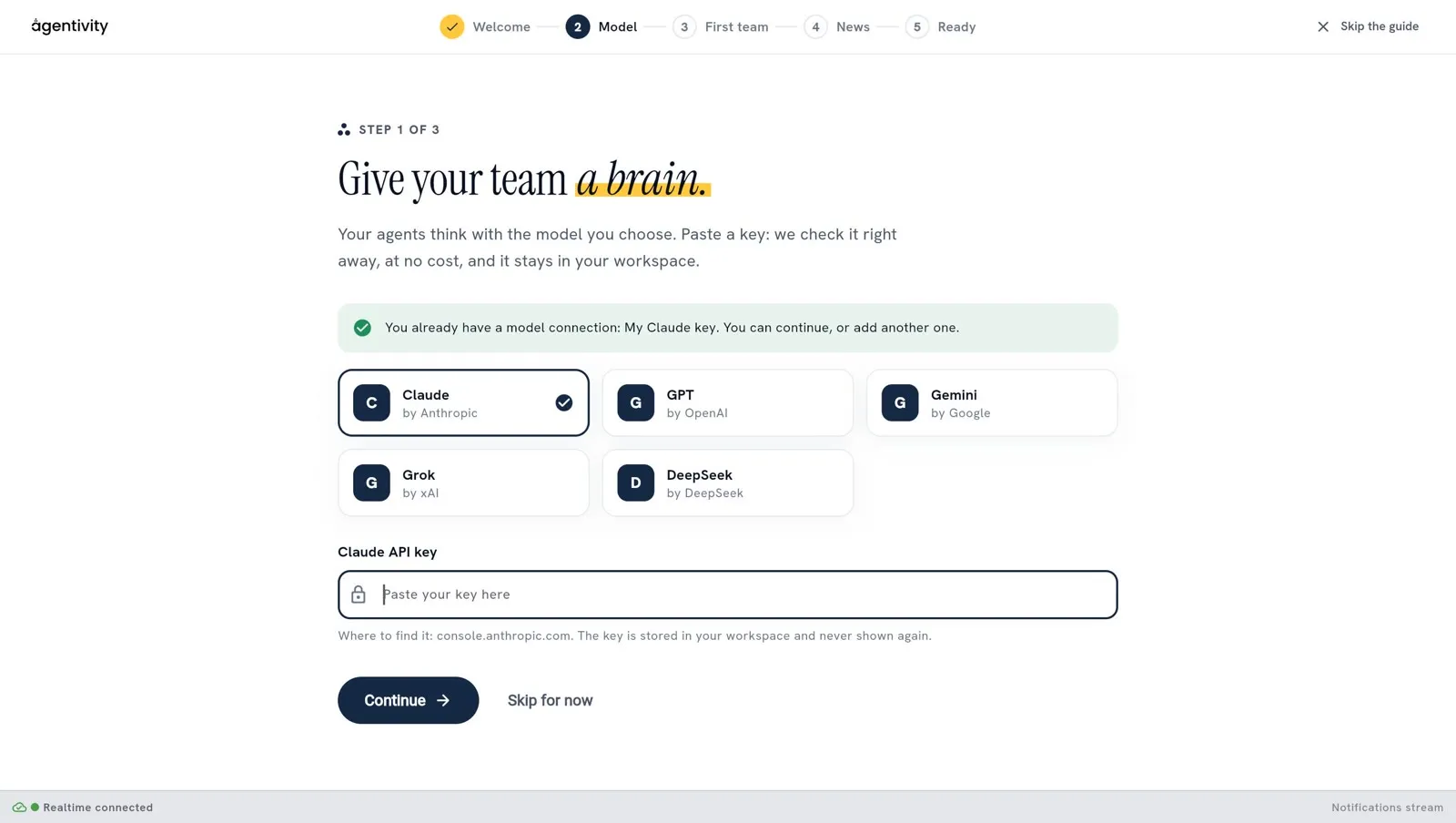 Step 1 of the welcome guide: five providers to choose from (Claude, GPT, Gemini, Grok, DeepSeek), a green line that says a model connection already exists, the field Claude API key, and the buttons Continue and Skip for now
