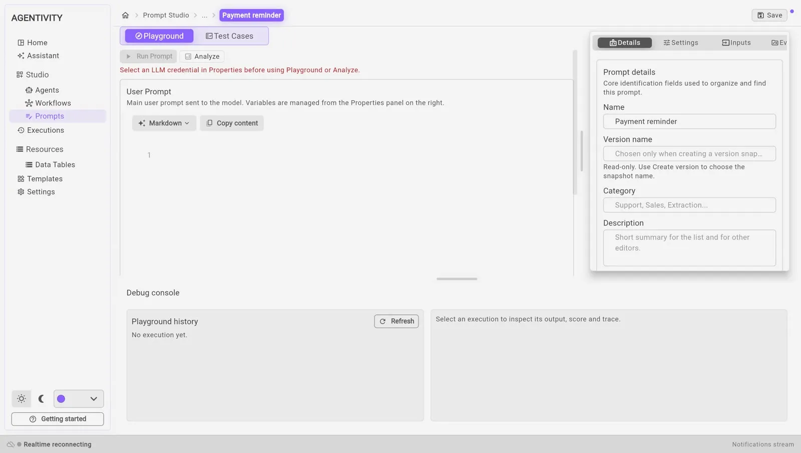 Prompt Studio: the tabs Playground and Test Cases, the buttons Run Prompt and Analyze, the editor of the User Prompt, a panel on the right with Details, Settings and Inputs, and the Debug console at the bottom